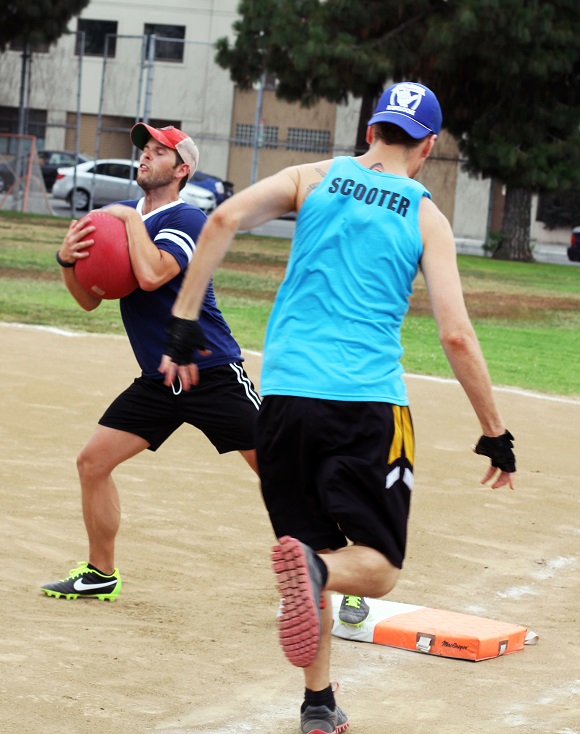 Richie Gregory tags out Christopher Tobin.