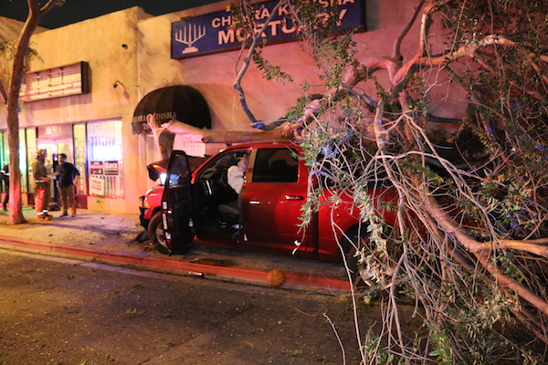 Pickup truck crash in front of Chevra Kadisha Mortuary at 7832 Santa Monica Blvd. (Photo by Jim Garrecht)