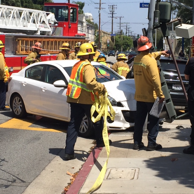A two-vehicle crash this afternoon at the intersection of Fountain Avenue and Crescent Heights Boulevard.