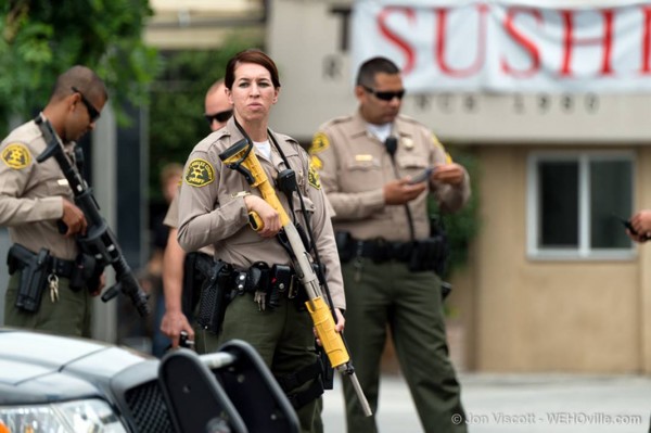 Sheriff's deputies armed with stun guns shut down Sunset Boulevard while fans line up to get wristbands for the Future concert (Photo by Jon  Viscott).