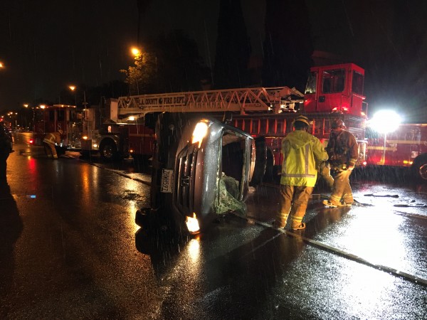 Car overturned on Fountain Avenue at Spaulding. (Photo by Jim Garrecht, ANG.NEWS)