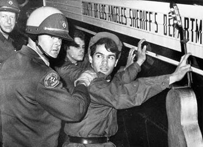 Peter Fonda being arrested at the Sunset Strip Curfew Riot in 1966.