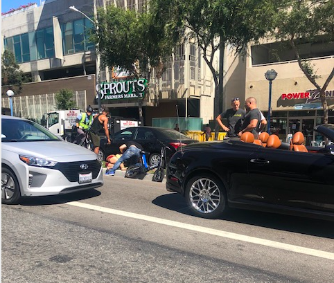 Wheels Rider Keels Over to Avoid a Car on Santa Monica Boulevard