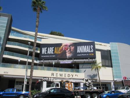 The We Are Animals image on an Outfront Media billboard on Sunset Boulevard.