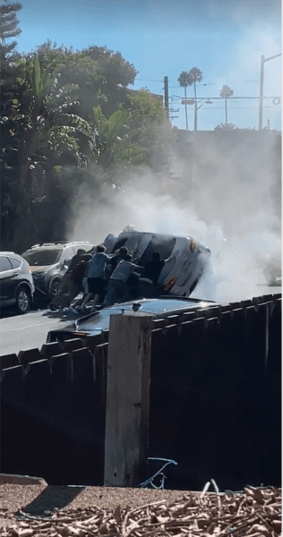 People Rush to Rescue a Woman From a Burning Car on Fountain Avenue - WEHOville